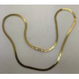 An 18ct flat gold chain necklace. 14.4gms. 51.5cms l.