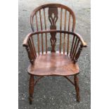 Oak and elm Windsor stick back armchair, turned legs, carved stretcher, height to seat 44cms, height