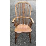 Windsor high back spindle armchair with turned legs and curved stretcher, height to seat 42cms,