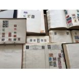 A large quantity of stamp albums and loose stamps etc including 8 albums British, World, German,