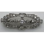 Early 20th century diamond set brooch with 29 old brilliant cut diamonds. Estimated total diamond