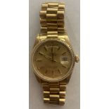A Gentleman's Oyster perpetual Day-Date wristwatch by Rolex, 18 carat gold, 3.5cms case width. Model
