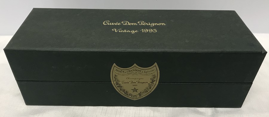 A bottle of Moet et Chandon, Cuvee Dom Perignon Champagne 1995, sealed and unopened in a box