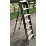 Set of pine 6 tread folding step ladders. 156cms h. Condition ReportOld worm holes to steps.