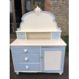 A 19thC painted dresser with shaped back and drawers & cupboard beneath. 119 w x 47 d x 160cms h.