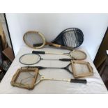 A collection of two Tennis and four Badminton rackets to include, a wooden Slazenger Challenge no.