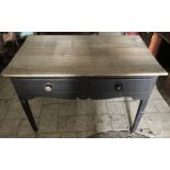 Victorian pine 2 drawer table on square tapered legs. 111 w x 66 d x 78cms h.