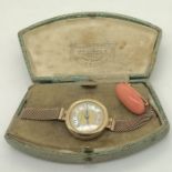 A 9ct gold cased Philex Lever ladies wristwatch with 9ct gold strap total weight 20.3 gms. And a