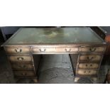 Mahogany twin pedestal desk, green leather top, 9 drawers. 152 w x 90 d x 75cms h.Condition