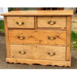 Pine chest of drawers two over two on plinth base