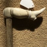 Whalebone walking stick with carved whales tooth ladies leg handle. 91cms l, handle 11cms w.