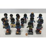 A collection of 15 Robertson's character figures of football and musician of various designs and