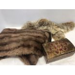 Fur stole, fur collar and a musical jewellery box.