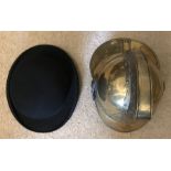 Bowler hat, Lombard, London and an Australian brass fireman's helmet.