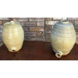 Pair of stoneware wine barrels 6 quart. 32cm h and 27cm h.