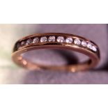 A 9ct gold ring set with diamonds. 2.2gms, size O.