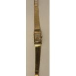 A ladies Omega Ladymatic 18 carat gold wrist watch, total weight 38.9gms.