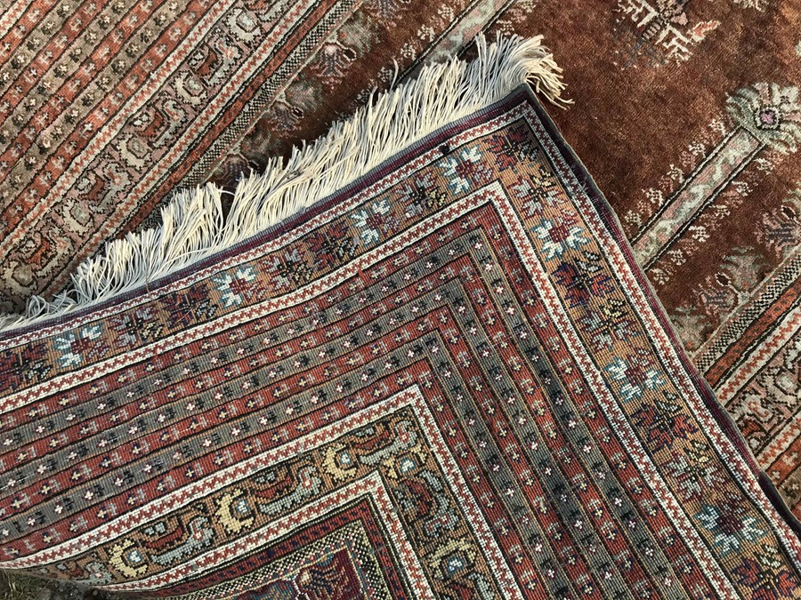 Brown patterned Persian rug, approx 185 x 124cms. - Image 2 of 2