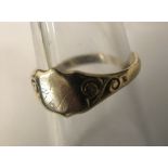 A 9ct yellow gold signet ring, size M, 1.3gms, shield shaped.