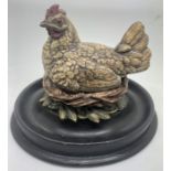 A cold painted spelter chicken inkwell. 11cms h.