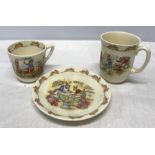 Royal Doulton Bunnykins cup and saucer with mug.Condition ReportCup has hairline crack to rim.