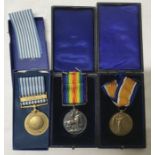 WW I group of 2 medals with ribbons and cases 241952 Pte E.Cross. Notts and Derby R together with