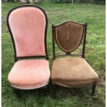 Two Victorian nursing chairs, one walnut framed pink upholstered on cabriole legs, 38 h to seat, 106