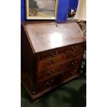 AN 18TH CENTURY MAHOGANY WRITING BUREAU / SECRETAIRE, with 5 drawers on ogee bracket feet, with drop