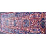 A PERSIAN ARDEBIL RUNNER, hand-knotted and woven, wool pile with vegetable dyes, 314 x 139 cm