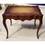 A MAHOGANY LEATHER TOPPED SIDE / COFFEE TABLE, raised on cabriole leg with shaped skirt, 26" x 17" x