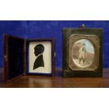 TWO FRAMED MINIATURES, (i) A silhouette of a young boy (ii) A print of Napolean coloured