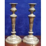 A PAIR OF 19TH CENTURY SILVER PLATED CANDLE STICKS, with tapered body, 11" tall approx each