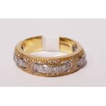 AN 18CT WHITE & YELLOW GOLD & DIAMOND BAND