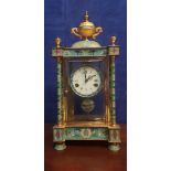 A LARGE CLOISONNE MANTLE CLOCK, with glazed sides, a ship decorated pendulum, 19.5" x 8.5" x 7.5"