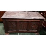 A 19TH CENTURY OAK PANELLED BLANKET BOX, with carved decoration, 4ft (W) x 27" (H) x 22" (D) approx