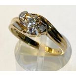 A 9CT YELLOW GOLD 3 STONE DIAMOND RING, with 3 brilliant cut diamonds in a vintage setting, superior