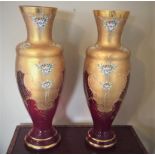 A PAIR OF VINTAGE ‘MURANO’ RUBY & GILT VASES, decorated with hand painted floral design, 16” tall