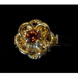 A 9CT YELLOW GOLD SINGLE GARNET RING, in a decorative setting, hallmarked, ring size: N