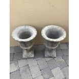 A PAIR OF STONE GARDEN URNS, 60 high approx