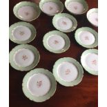 A PORCELAIN DESSERT SERVICE, 7 dessert plates, 4 cake stands