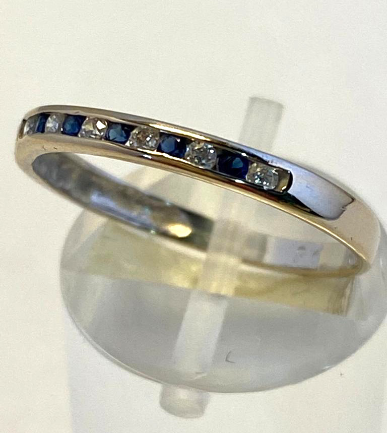 A 9CT WHITE GOLD SAPPHIRE & DIAMOND BAND, in a channel setting, 5 sapphire stones and 6 diamonds, - Image 4 of 4