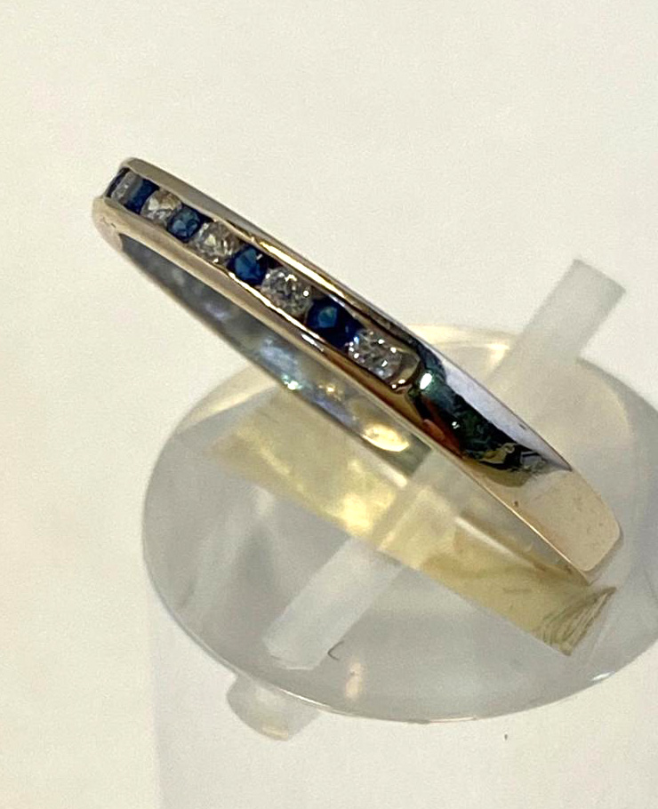 A 9CT WHITE GOLD SAPPHIRE & DIAMOND BAND, in a channel setting, 5 sapphire stones and 6 diamonds, - Image 2 of 4