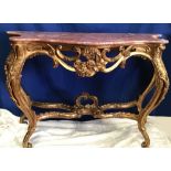 A VERY FINE MARBLE TOPPED CONSOLE TABLE, the carved base with intricate scroll and foliage detail,