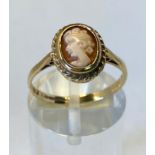 9CT YELLOW GOLD CAMEO RING, an elegant ring, with carved face of a lady in an ornate bezel