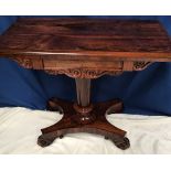 A VERY FINE WILLIAM IV ROSEWOOD FOLD OVER CARD TABLE, carved scroll detail to the frieze raised on a