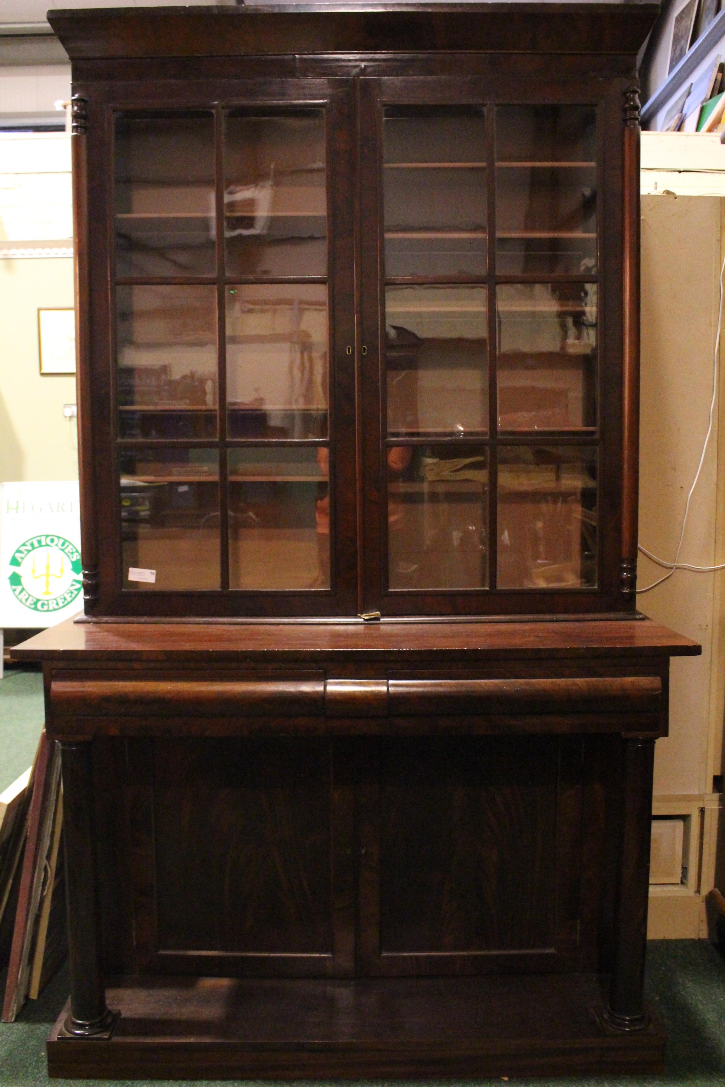 A VERY FINE 19TH CENTURY GLAZED BOOKCASE, two door bookcase, over 2 drawers, supported by turned