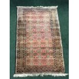 A GOOD QUALITY TURKOMAN ‘NABAT’ FLOOR RUG, with multiple borders, including ribbon motif, the centre