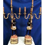 A PAIR OF TABLE LAMPS / CANDELABRA, in the form of stylised figures, each with four lamp heads, each