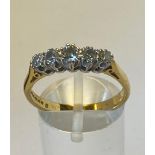 AN 18CT YELLOW GOLD GRADUATED FIVE STONE DIAMOND RING