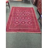 A HAND WOVEN ‘BARGESTA’ FLOOR RUG, with carefully hand cut embossed motifs, a known feature of